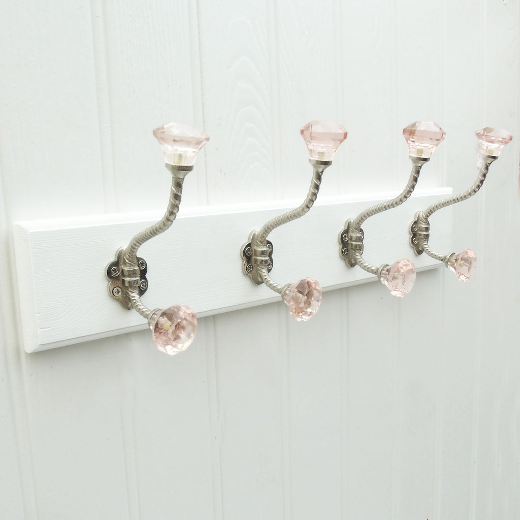 A Shabby Chic White Wooden Coat Hook Rack with 4 Pink Glass Hooks