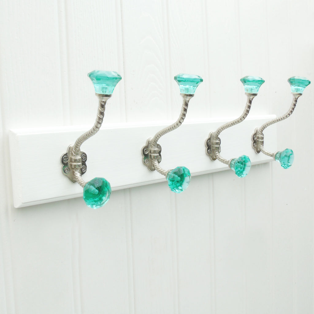 A Shabby Chic White Wooden Coat Hook Rack with 4 Green Glass Hooks